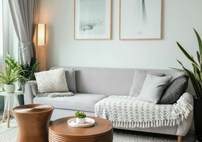 Residential house cleaning services, showing a spotless living area and bedroom.