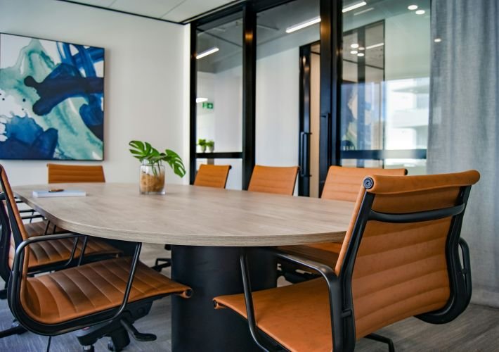 Professional commercial cleaning for a modern office conference room